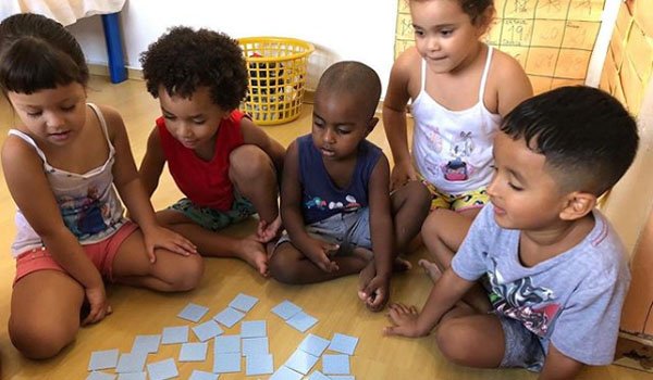 kindergarten student learning card games