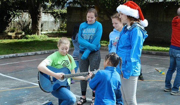 volunteer singing songs for kids